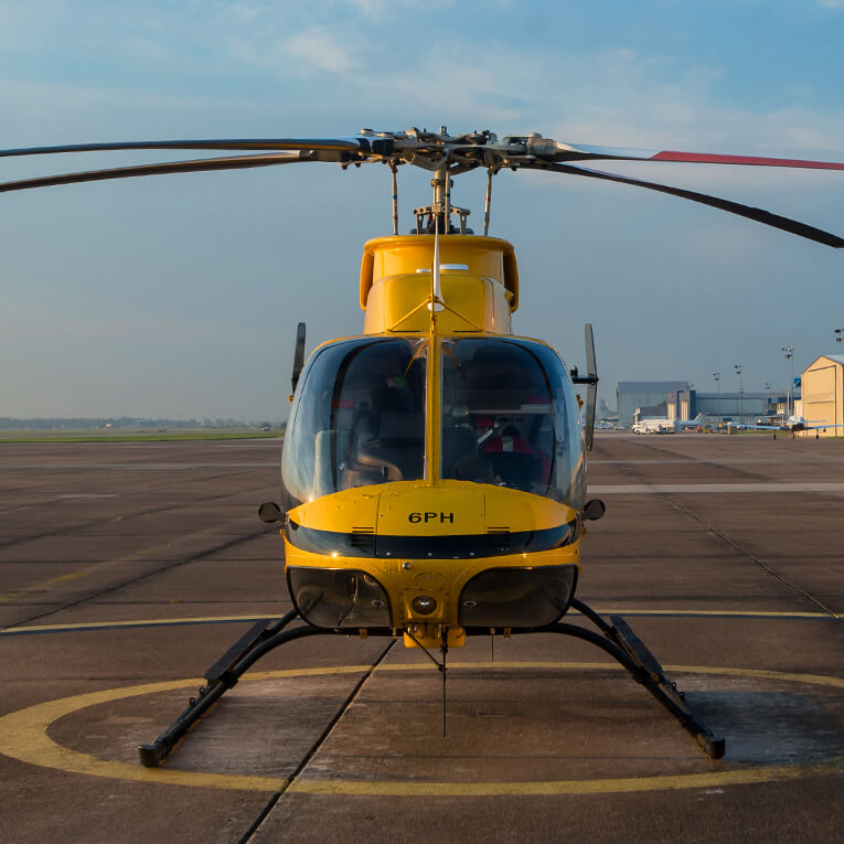 Helicopter 6PH on a landing pad